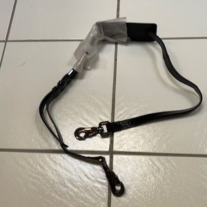 Strap cross body bag